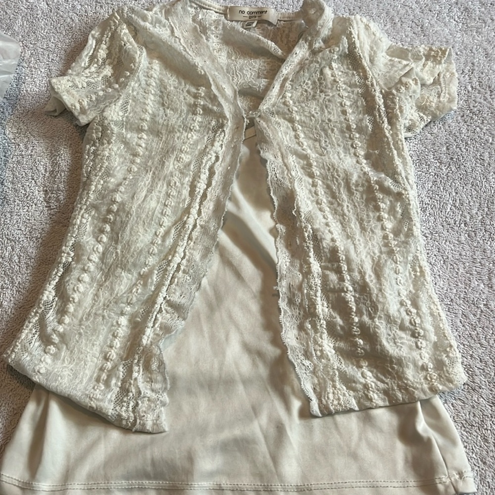 This is a beautiful cream color shirt